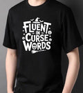 Fluent in Curse Words Halloween T-Shirt in black with bold typography design
